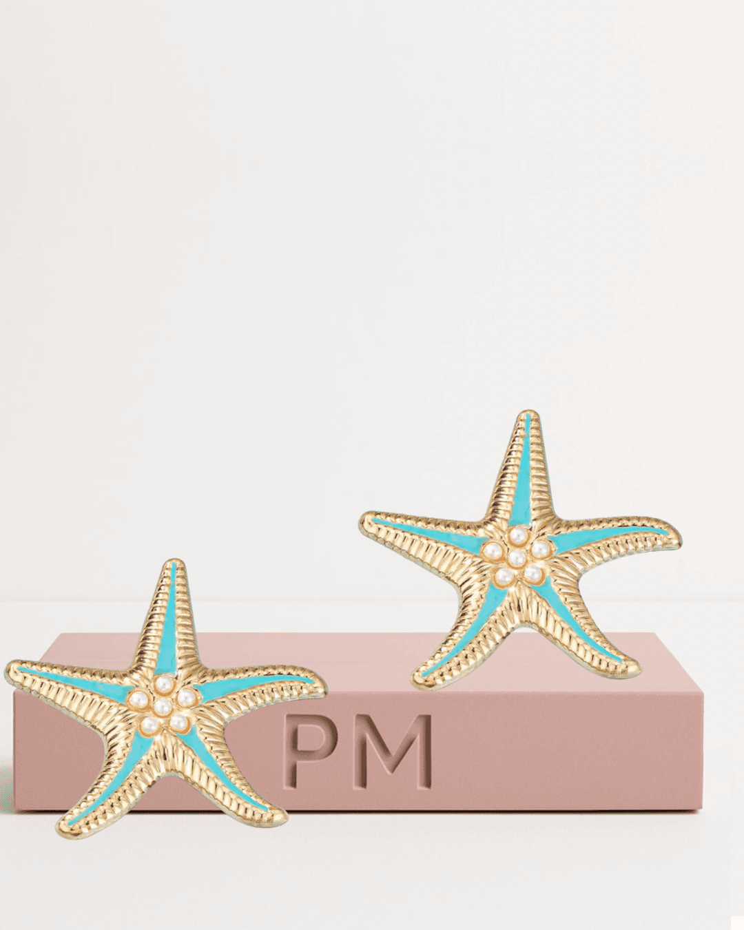 Boucle d'oreille étoile de mer bleue